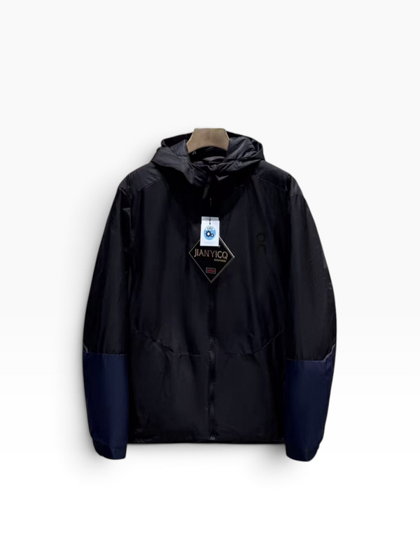 Giacca con cappuccio Colorblock On Running – Nero/Blu navy