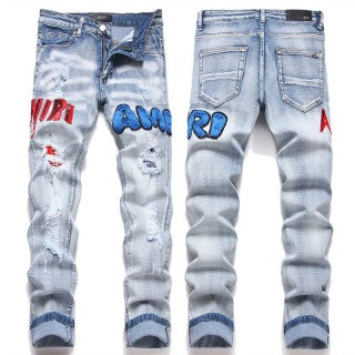 Jeans Amiri azzurro chiaro con logo multicolore