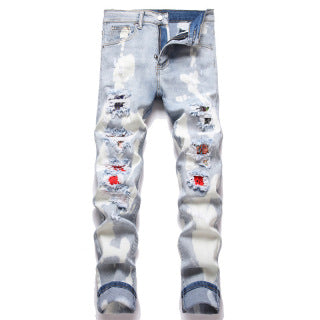 Jeans Amiri camouflage azzurro chiaro effetto usurato