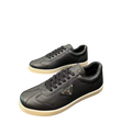 Prada Pebbled Leather Low-Top Sneakers – Black