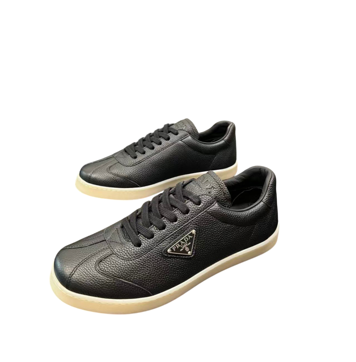 Prada Pebbled Leather Low-Top Sneakers – Black