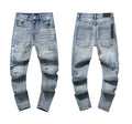Amiri Distressed Logo Skinny Jeans – Light Wash