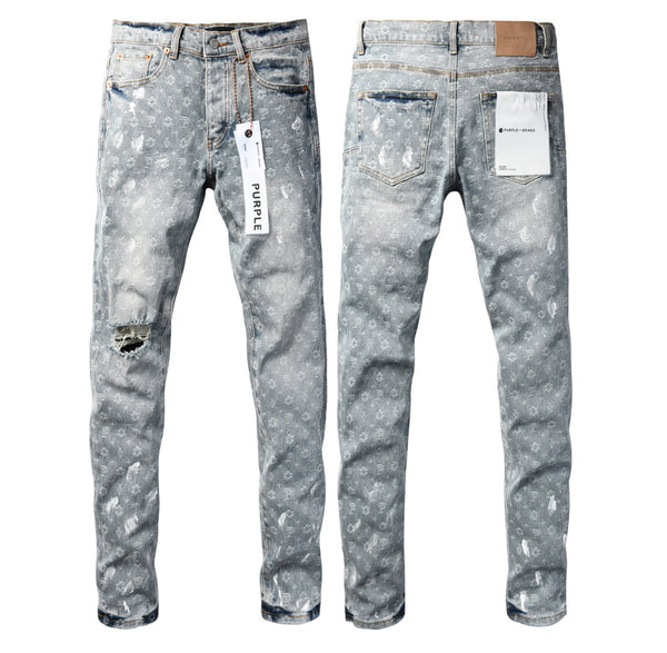 Jeans in denim effetto vissuto grigi con monogramma viola del brand
